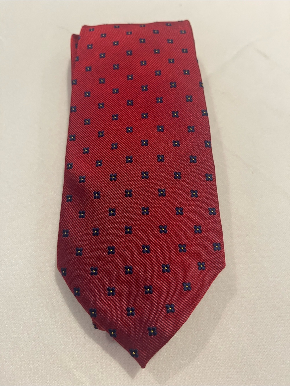 Classic Men's Red Tie with Navy Dot Accent